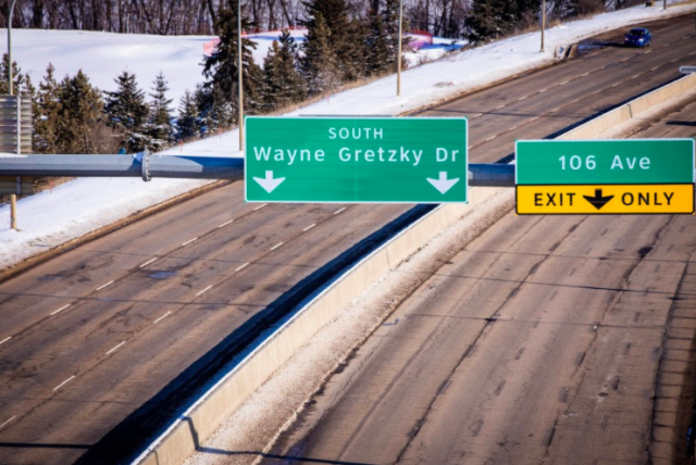 Signs big and small of a pandemic in Edmonton