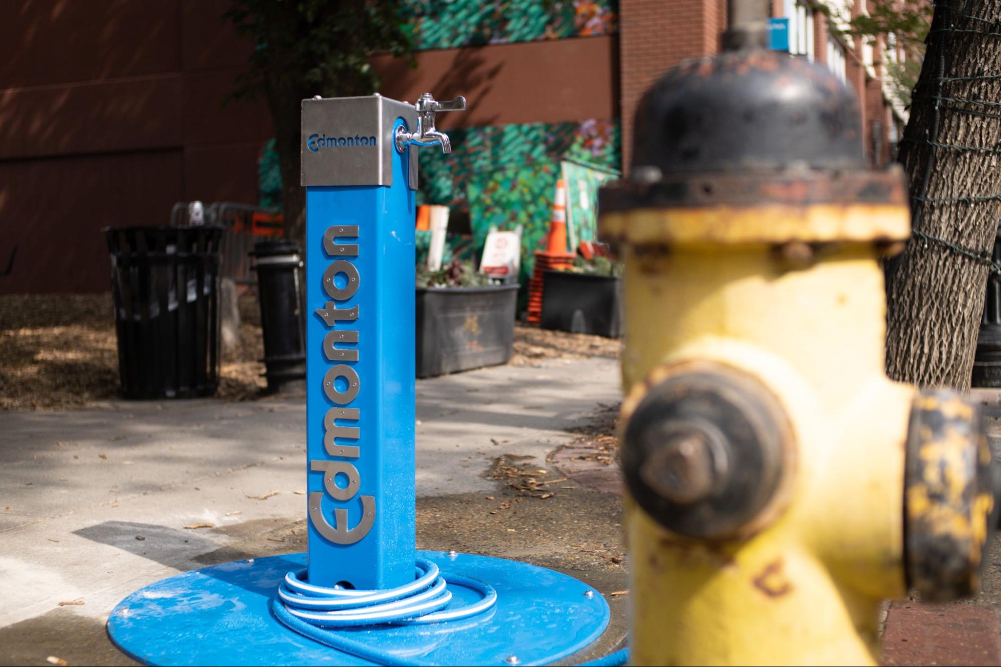 Fire hydrants tapped for fresh drinking water in Edmonton heat