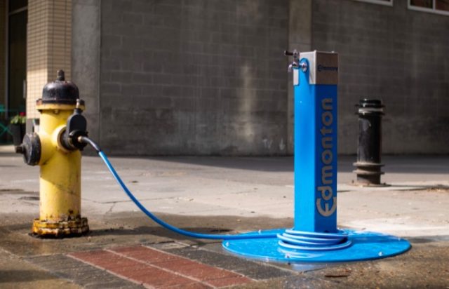 Fire hydrants tapped for fresh drinking water in Edmonton heat
